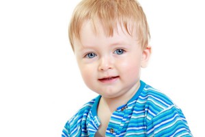Ребенок улыбается (фото: Fotolia)