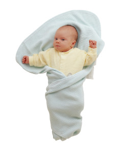 Младенец в пеленках - фото