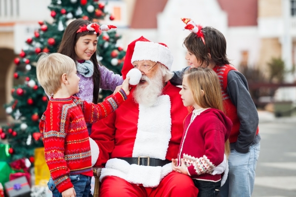 Children Playing With Santa Claus's Hat