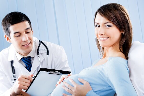 Беременная у врача - фото